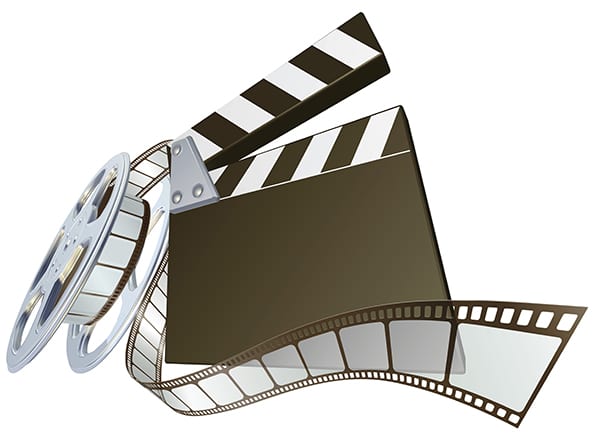 Film clapperboard and movie film reel