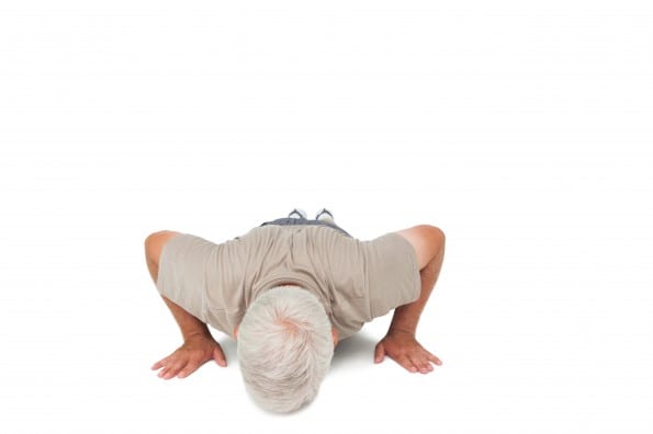 Senior man doing push ups