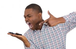 Angry upset man shouting on a cell phone