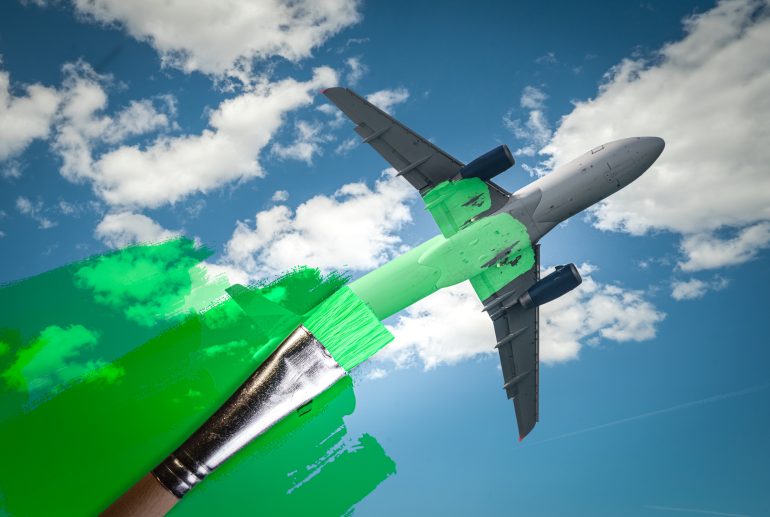 Vliegtuig wordt groen geverfd (greenwashing)